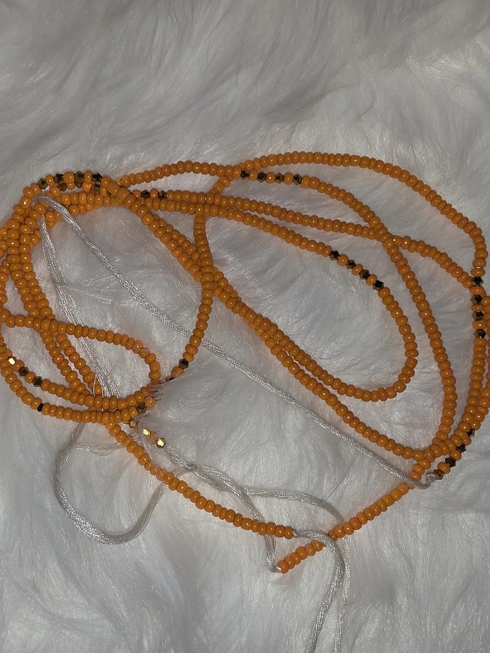 Handcrafted Orange Beaded Hair Wrap with Tassel Accent